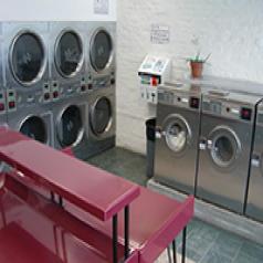 Huebsch washers and dryers in a laundry room